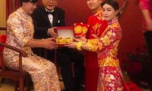 Cô dâu Văn Vịnh San đeo vàng trĩu tay