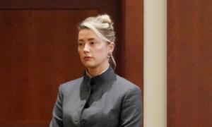 Công ty bảo hiểm từ chối đóng phạt giúp Amber Heard
